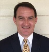 Headshot photo of John Cook