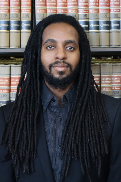 Headshot photo of Kamau Allen